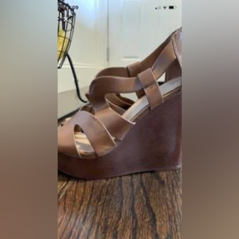 Aldo leather brown size 8 wedges with zip back.